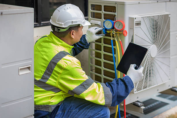 Professional Air Conditioning Repair technician working in Estherville, IA